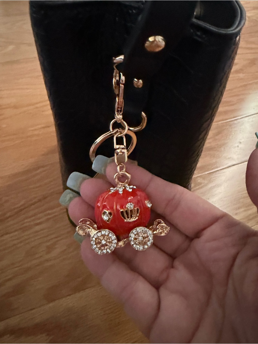 Gold-Tone Orange Carriage Keychain Charm